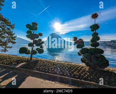Lugano, Schweiz. Atemberaubender Blick auf die Schweizer Stadt, umgeben von See und Bergen. Stockfoto