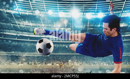 Nahaufnahme einer Fußball-Actionszene mit Fußballspieler tritt einen Fußballball im Stadion Stockfoto