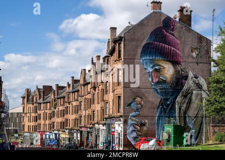 Smug's Riese, unbetiteltes Wandbild von „Saint Mungo“. Das 2016 fertiggestellte Wandbild ziert das gesamte Giebelende der 287 High Street in Glasgow Stockfoto