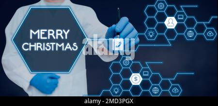 Textbeschriftung mit Frohe Weihnachten. Konzept bedeutet jährliche Tradition zur Feier der Geburt Jesu Christi Stockfoto