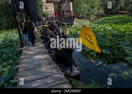 Kashmiri Shiite Muslims shout religious slogans as they participate in ...
