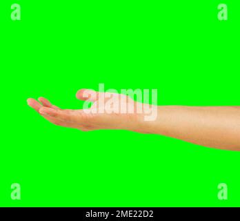 Nahaufnahme der Handpräsentation mit isoliertem Ausschnitt im Kopierbereich auf grünem Hintergrund mit Chroma-Taste Stockfoto