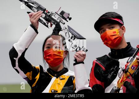 Yang Qian, left, and Yang Haoran, of China, compete in the mixed team ...