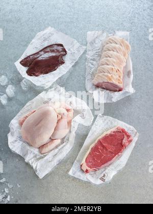 Lammleber, Schweinelende, ganzes Huhn und Lendensteak Stockfoto