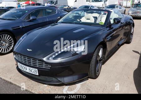 Three-Quarter's Front View of a Dark Silver, 2014, Aston Martin DB9, ausgestellt im Aston Martin Owners Club Bereich, im 2022 Silverstone Classic Stockfoto