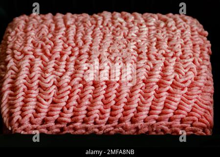 Hackfleisch mit der Konsistenz von Hackfleisch/Faschiertem, roh und ungekocht. Stockfoto
