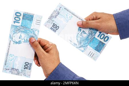 Hand auf isoliertem weißen Hintergrund, der brasilien Geld bietet, hundertfünfzig Reais-Banknoten, brasilianische Wirtschaft. Stockfoto