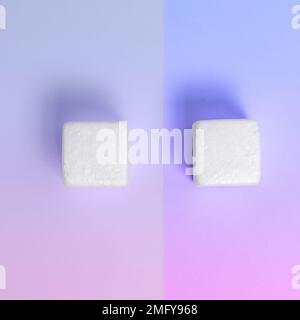 Weiße Styroporwürfel auf dem farbigen Schreibtisch. Brandneue Informationen. Stockfoto