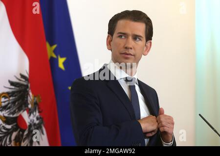 Austrian Chancellor Sebastian Kurz speaks during a press conference at the federal chancellery in Vienna, Austria, Tuesday, July 21, 2020. The Austrian government has moved to restrict freedom of movement for people, in an effort to slow the onset of the COVID-19 coronavirus. (AP Photo/Ronald Zak)