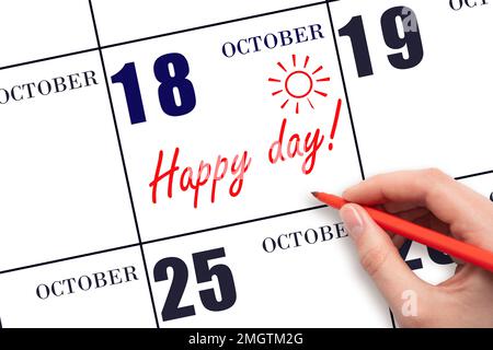 18. Oktober-Tag. Schreiben Sie mit der Hand den Text HAPPY DAY und Drawing the Sun am Kalendertag 18. Oktober. Merken Sie sich das Datum vor. Feiertage. Motivation. Herbst Stockfoto