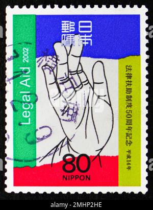 MOSKAU, RUSSLAND - 25. DEZEMBER 2022: In Japan gedruckte Briefmarken zeigen 50. Jubiläum des Rechtshilfesystems, ca. 2001 Stockfoto