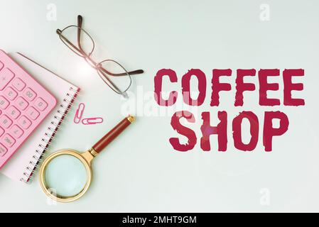 Schriftzug mit Text Coffee Shop. Business-Konzept kleines Restaurant mit ungezwungener Atmosphäre, in dem Kaffee und leichte Erfrischungen serviert werden Stockfoto