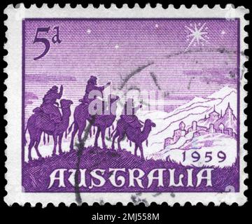 AUSTRALIEN - CA. 1959: Ein in AUSTRALIEN gedruckter Stempel zeigt den Ansatz der Magi, Weihnachtsausgabe, ca. 1959 Stockfoto