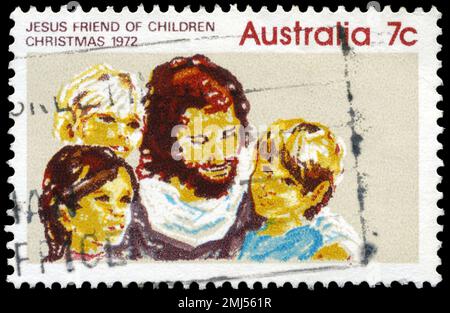 AUSTRALIEN - CIRCA 1972: Ein in AUSTRALIEN gedruckter Stempel zeigt die Jesus and Children, Weihnachtsausgabe, circa 1972 Stockfoto