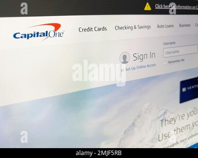 Capital One's website is seen alerting customers to 'click here, for information on Capital One's cyber incident' on Tuesday, July 30, 2019, in Pembroke Pines, Fla. Capital One says a hacker got access to the personal information of over 100 million individuals applying for credit. The McLean, Virginia-based bank said Monday, July 29, it found out about the vulnerability in its system July 19 and immediately sought help from law enforcement to catch the perpetrator. (AP Photo/Brynn Anderson)