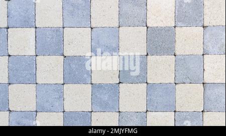 Steinwand weißer nahtloser Hintergrund Kopfsteinpflaster Straße horizontale Tapete grauer Hintergrund Stockfoto