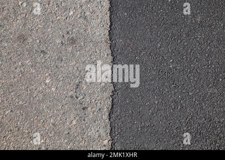 Linie zwischen altem und neuem Asphalt auf der Straße Stockfoto