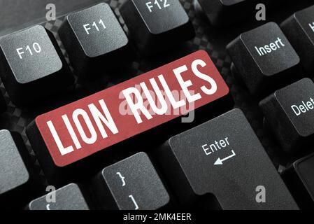 Schreiben mit Text Lion Rules. Geschäftsidee, Inbegriff von Stärke, Stärke und Männlichkeit, Meister des eigenen Bereiches Stockfoto