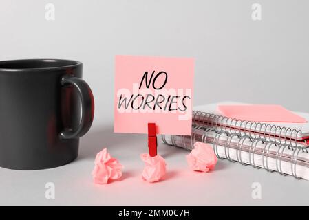 Textzeichen mit „No Worries“ (Keine Sorgen). Ein Wort für einen Ausdruck, der besagt, dass alles in Ordnung ist Stockfoto