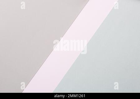 Abstrakte Pastelltöne und stumme Farbtöne minimalistischer Hintergrund mit Papierstruktur. Geometrischer, blasser, flacher Papierhintergrund. Minimalismus, Geometrie und symm Stockfoto
