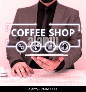 Schriftzug mit Text Coffee Shop. Kleines Restaurant mit ungezwungener Atmosphäre, in dem Kaffee und leichte Erfrischungen serviert werden Stockfoto