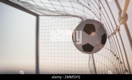 Nahaufnahme eines Fußballballs, der ein Tor schießt Stockfoto