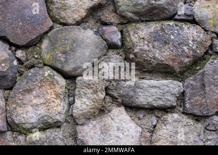 Altes Steinmauerwerk. Alte architektonische Struktur Stockfoto