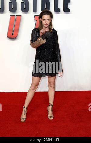 Actress Rebecca Ferguson poses for photographers as she arrives for the