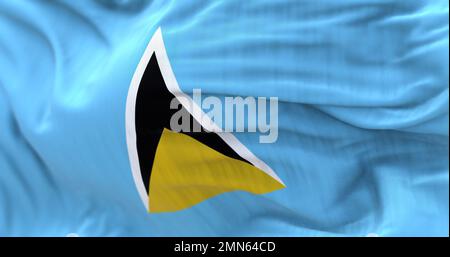 Detail der Nationalflagge der Heiligen Lucia, die im Wind winkt. St. Lucia ist ein Inselstaat des Commonwealth in Mittelamerika. Geriffelter Stoff. Textur Stockfoto