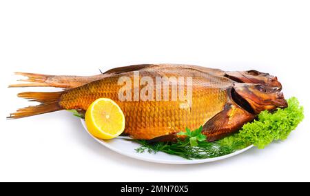 Leckeren geräucherten Fisch auf einer Platte Stockfoto