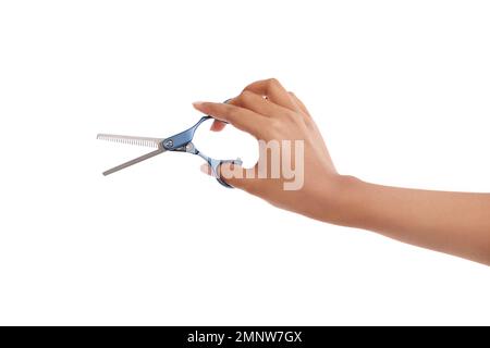 Zeit für einen neuen Stil. Eine Frau, die eine Haarschneideschere in der Hand hält. Stockfoto