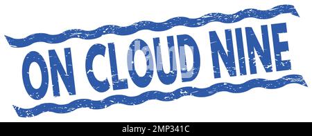 AUF WOLKE 9 Text auf blauem Stempelzeichen geschrieben. Stockfoto