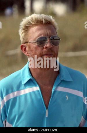 Exklusiv!! Boris Becker und seine Verlobte Sharlely Kersenberg gehen am Strand joggen. Becker wird bald Ehefrau und hat das Tennis-Ass im Staub gelassen, als er einem verschwitzten Boris vorfuhr. Das Paar wird später in diesem Jahr heiraten. Miami, Florida 3/31/09. Stockfoto