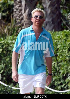 Exklusiv!! Boris Becker und seine Verlobte Sharlely Kersenberg gehen am Strand joggen. Becker wird bald Ehefrau und hat das Tennis-Ass im Staub gelassen, als er einem verschwitzten Boris vorfuhr. Das Paar wird später in diesem Jahr heiraten. Miami, Florida 3/31/09. Stockfoto