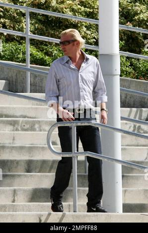 Exklusiv!! Boris Becker produziert einen Fernsehfilm für deutsches Fernsehen in der Miami American Airlines Arena. Das Tennis-Ass musste wiederholt die Treppen hoch und runter laufen, um seinen Wurf zu machen, 10/31/06 All Stockfoto