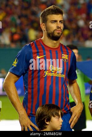 Shakiras Freund Gerard Pique (Nr. 3) spielt beim Herbalife World Football Challenge-Spiel im Sun Life Stadium in Miami, Florida, mit dem FC Barcelona in seinem Spiel mit CD Guadalajara. 3. August 2011. Stockfoto