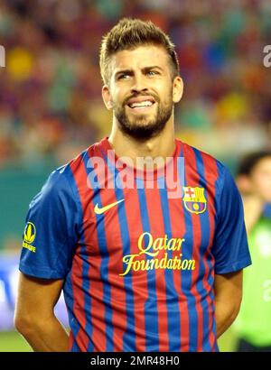 Shakiras Freund Gerard Pique (Nr. 3) spielt beim Herbalife World Football Challenge-Spiel im Sun Life Stadium in Miami, Florida, mit dem FC Barcelona in seinem Spiel mit CD Guadalajara. 3. August 2011. Stockfoto