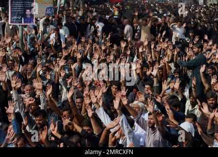 Shiite Muslims chant religious slogans during a Muharram procession, in ...