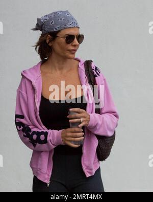 EXKLUSIV!! Die amerikanische Schauspielerin und Moderatorin von SoapNet's Soap Talk, Lisa Rinna, wird gesehen, wie sie ihr Luxushotel in Miami Beach, FL, verlässt. 11/20/2009 . Stockfoto