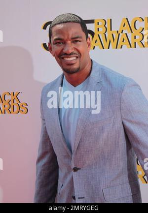 Der C-Schauspieler und der Veranstalter der Preisverleihung Laz Alonzo posiert auf dem roten Teppich vor den McDonald's 365 Black Awards im Mahalia Jackson Theatre in New Orleans, Louisiana. 6. Juli 2012 Stockfoto