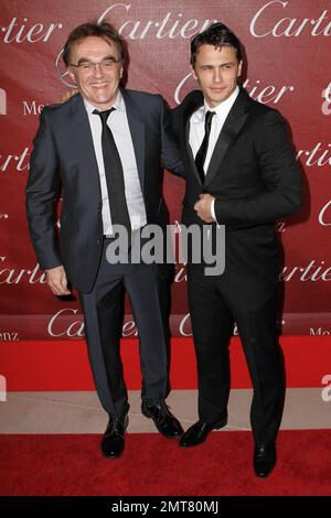 "127 Stunden" Regisseur Danny Boyle und Star von "127 Stunden" James Franco auf dem roten Teppich bei der jährlichen Palm Springs International Film Festival Awards Gala 22. im Palm Springs Convention Center. Palm Springs, Kalifornien. 01/08/11. Stockfoto