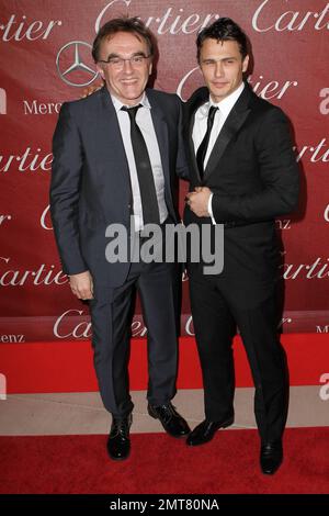 "127 Stunden" Regisseur Danny Boyle und Star von "127 Stunden" James Franco auf dem roten Teppich bei der jährlichen Palm Springs International Film Festival Awards Gala 22. im Palm Springs Convention Center. Palm Springs, Kalifornien. 01/08/11. Stockfoto