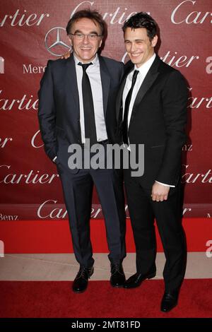 "127 Stunden" Regisseur Danny Boyle und Star von "127 Stunden" James Franco auf dem roten Teppich bei der jährlichen Palm Springs International Film Festival Awards Gala 22. im Palm Springs Convention Center. Palm Springs, Kalifornien. 01/08/11. Stockfoto