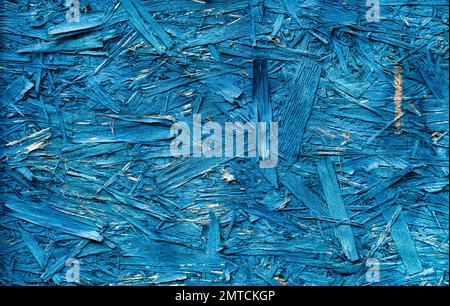 Die OSB-Platte ist blau. Abstrakte Textur von Baustoffen aus umweltfreundlichen Bauteilen. Stockfoto