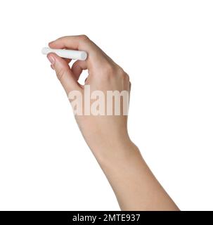 Eine Frau, die ein Stück Kreide hält, isoliert auf weißem, Nahaufnahme Stockfoto