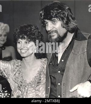 Country music legend Waylon Jennings gestures during an interview in