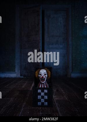 Ein böser Clown in einer Kiste spukte Spielzeug auf dem Boden in einem leeren verlassenen Haus. Halloween Horror Story Konzept 3D-Rendering. Stockfoto