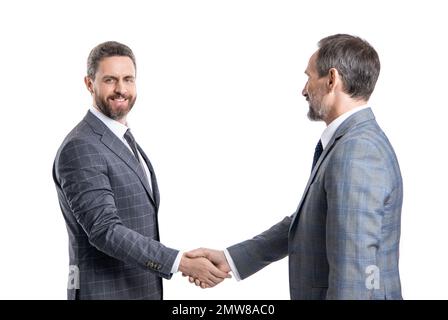 Zwei glückliche Geschäftsmänner, die handeln, Partnerschaft. Geschäftsleute, die isoliert auf Weißen handeln Stockfoto