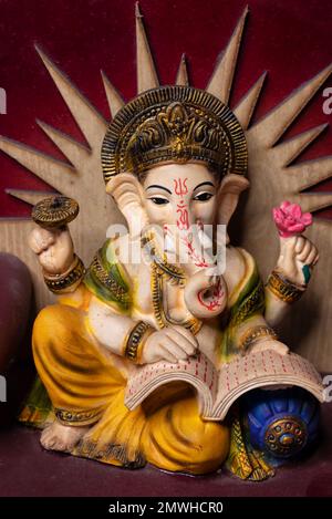 Großaufnahme von Lord Ganesha, ist eine der am meisten verehrten Gottheiten im Hinduismus. Lord Ganesha galt als die Göttin des Neubeginns, Weisheit A. Stockfoto