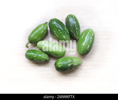 Ivy Gourd (Coccinia grandis), auch bekannt als Scharlachkrokodil, Tindora und Kowai, ist eine tropische Reben der Familie Cucurbitaceae. Hauptsächlich in Indien zu finden. Stockfoto